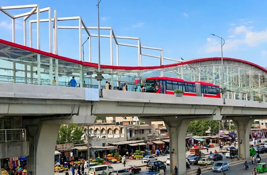 Chandni Chowk Metro Station Rawalpindi - red metro bus at elevated station on Murree Road